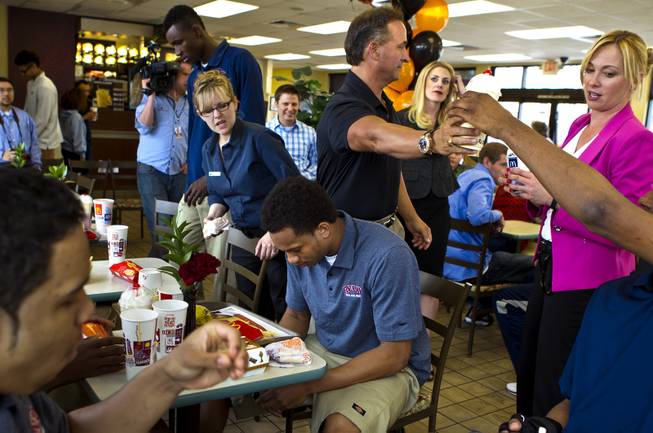 Findlay Prep guard Rashad Vaughn prays before dining with teammates while at a local McDonald's on Thursday, March 27, 2014.  He is the star of UNLV basketball's 2014 recruiting class and now honored as a McDonald's All-American.