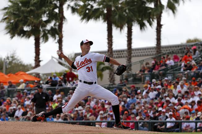 Baltimore Orioles starting pitcher Ubaldo Jimenez (31) throws in the first inning of an exhibition spring training baseball game against the Philadelphia Phillies in Sarasota, Fla., Friday, March 7, 2014.