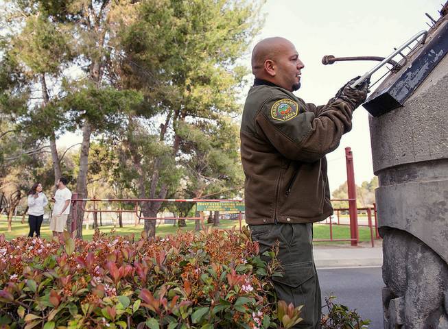 Orange County Parks grounds keeper Frank Amaro removes the supports to the sign at the entrance of Ralph B. Clark Regional Park in Buena Park in Fullerton, Calif.,  on Saturday, March 29, 2014,  morning after rangers discovered it fell off it's supports after an earthquake hit Orange County Friday night.   More than 100 aftershocks have rattled Orange County south of Los Angeles where a magnitude-5.1 earthquake struck Friday.  Despite the relatively minor damage, no injuries have been reported. (AP Photo/The Orange County Register, Ken Steinhardt)   MAGS OUT; LOS ANGELES TIMES OUT