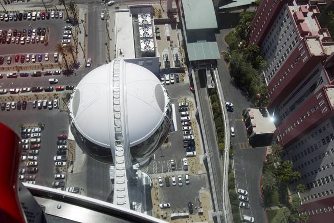 A view looking down during a ride on the 550-foot-tall High Roller observation wheel Monday, March 31, 2014. The observation wheel, the tallest in the world, is part of the Linq project, a $550 million development by Caesars Entertainment Corp.