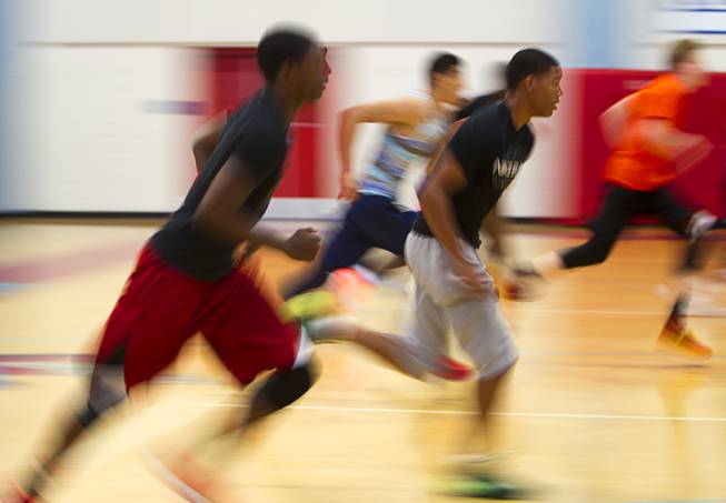 Members of the Las Vegas Knicks run during practice at Western High School Wednesday, April 2, 2014. The club team has gone from starting its program to being nationally ranked in three years. Now they have a sponsorship from Reebok.