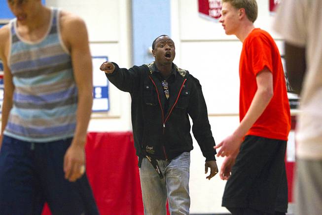 Las Vegas Knicks coach Lamar Bigby instructs players during practice at Western High School on Wednesday, April 2, 2014. The club team has gone from starting its program to being nationally ranked in three years. Now it has sponsorship from Reebok.