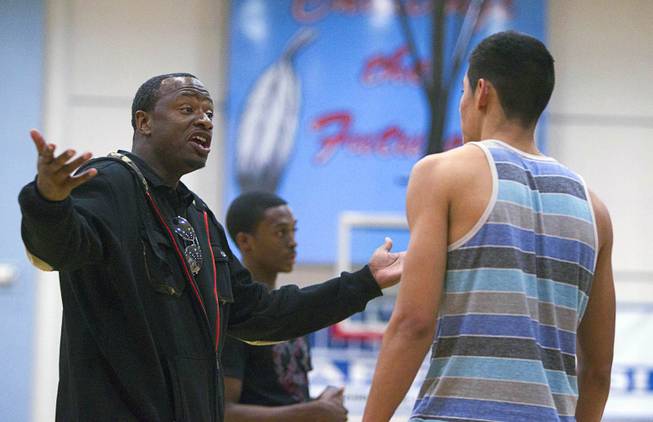 Las Vegas Knicks coach Lamar Bigby gives instruction to Ulises Santillan during practice at Western High School Wednesday, April 2, 2014. The club team has gone from starting its program to being nationally ranked in three years. Now they have a sponsorship from Reebok.