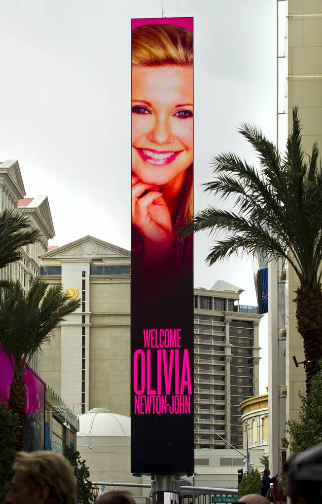 Olivia Newton-John signage marking her official Las Vegas arrival with a welcome event along the Linq at the Flamingo on Wednesday, April 2, 2014.
