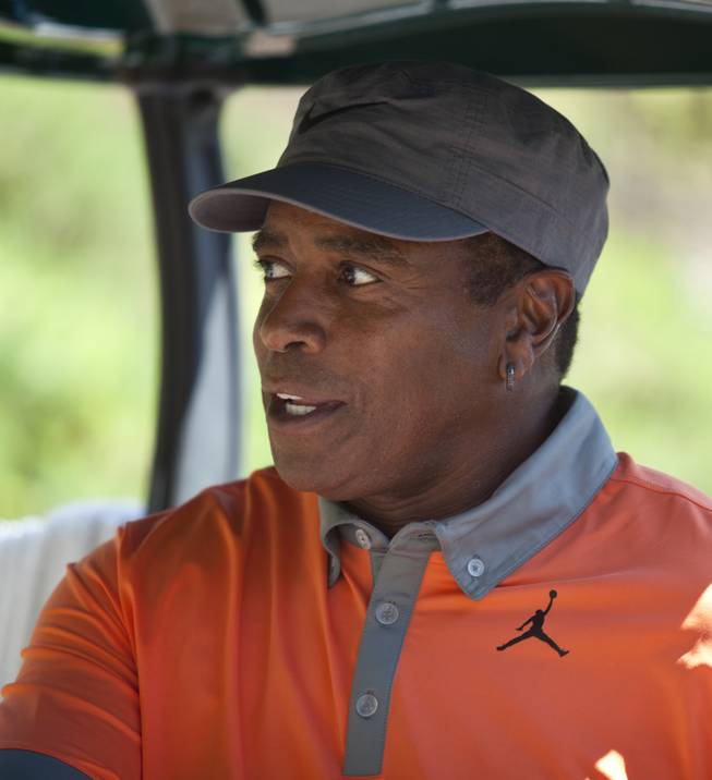 Former NFL player Ahmad Rashad talks about his score during opening day play of the Michael Jordan Celebrity Invitational at Shadow Creek Golf Course on Thursday, April 3, 2014.