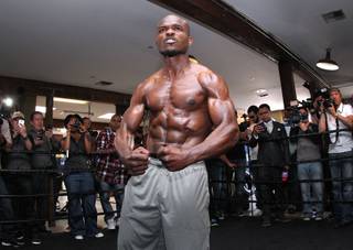 Undefeated WBO World Welterweight champion Timothy Bradley flexes during media day during media day Thursday, April 3, 2014 at Fortune Gym in Hollywood, Calif. for his eagerly-anticipated rematch against superstar Manny Pacquiao.