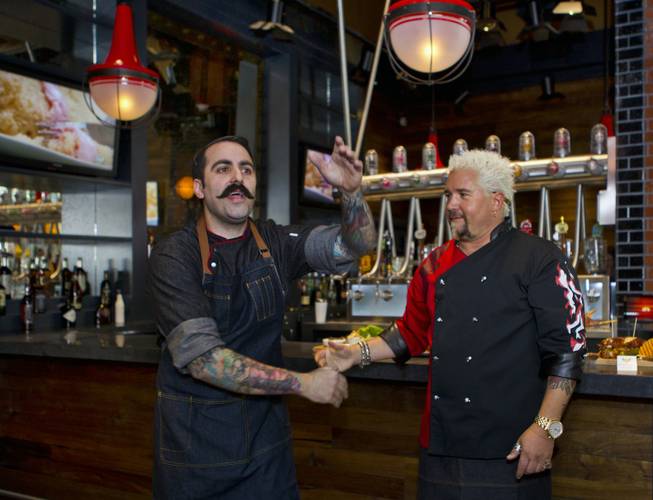 Guy Fieri introduces Anthony Leitera, the executive chef at his first Las Vegas restaurant Guy Fieri's Vegas Kitchen & Bar on Friday, April 4, 2014.
