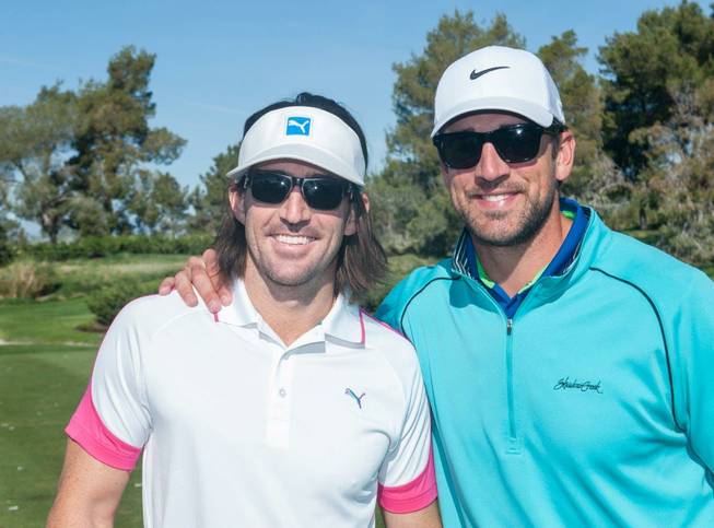 Jake Owen and Aaron Rodgers on opening day of the 2014 Michael Jordan Celebrity Invitational pro-am golf tournament Thursday, April 3, 2014, at Shadow Creek Golf Course.