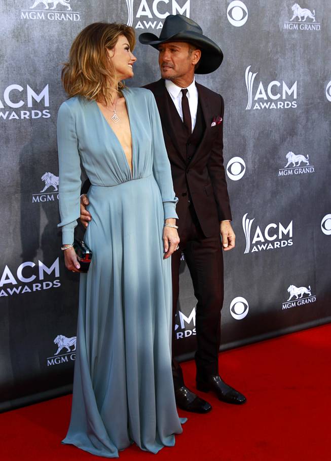 Faith Hill and Tim McGraw arrive for the 49th Academy of Country Music Awards show at the MGM Grand Garden Arena Sunday, April 6, 2014.