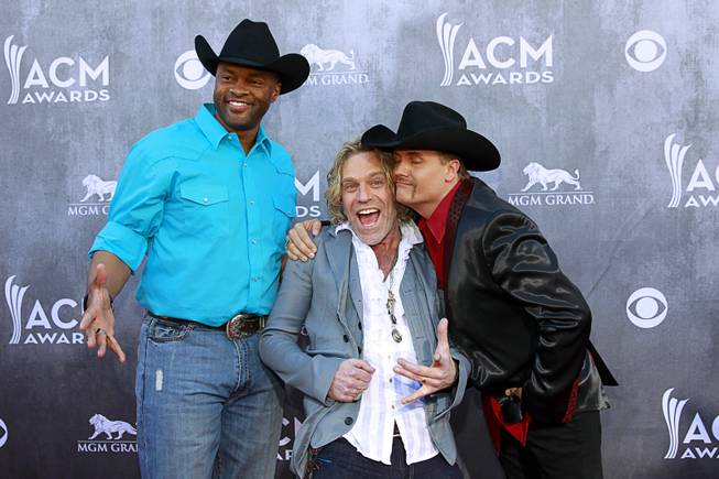 Cowboy Troy and Big Kenny and John Rich of Big & Rich arrive for the 49th Academy of Country Music Awards at MGM Grand Garden Arena on Sunday, April 6, 2014, in Las Vegas.