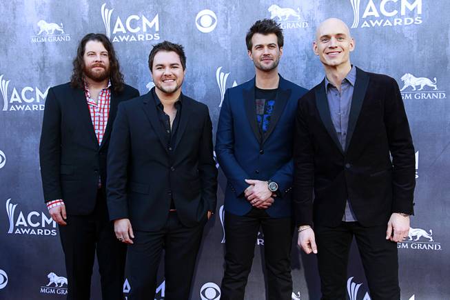 Mike Eli, James Young, Chris Thompson and Jon Jones of the Eli Young Band arrive for the 49th Academy of Country Music Awards at MGM Grand Garden Arena on Sunday, April 6, 2014.