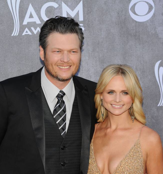 Blake Shelton and Miranda Lambert arrive on the red carpet at the 49th Annual Academy of Country Music Awards on Sunday, April 6, 2014, at MGM Grand Garden Arena.