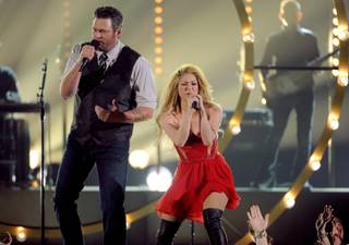 Blake Shelton, left, and Shakira perform on stage at the 49th annual Academy of Country Music Awards at the MGM Grand Garden Arena on Sunday, April 6, 2014, in Las Vegas. 