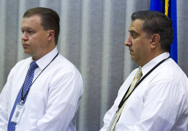Clark County School District Police Detectives Mitch Macizak, left, and Thomas Rainey attend a news conference at CCSD police headquarters in Henderson Tuesday, April 8, 2014. Police called the news conference to discuss a fight that occurred at O'Callaghan Middle School last Wednesday.