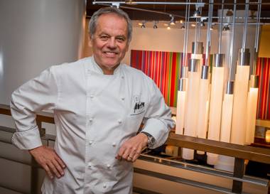 Wolfgang Puck signs copies of his newly released cookbook “Wolfgang Puck Makes It Healthy: Light, Delicious Recipes and Easy Exercises for a Better Life,” on April 9 at his restaurant Spago at the Forum Shops.