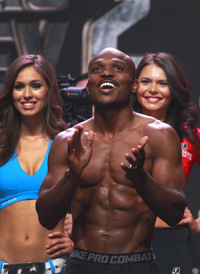 Undefeated WBO welterweight champion Timothy Bradley reacts to cheers from fans during an official weigh-in at the MGM Grand Garden Arena Friday, April 11, 2014. Bradley will defend his title against Manny Pacquiao of the Philippines at the arena on Saturday. The fight is a rematch to a June 9, 2012 fight that Bradley won.