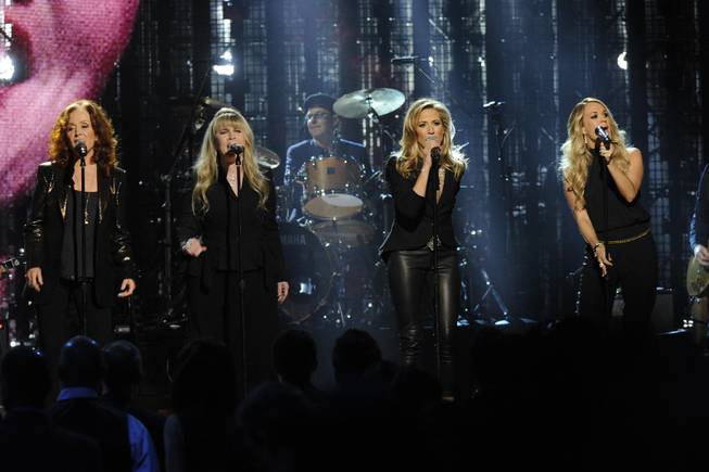 Bonnie Raitt, Stevie Nicks, Sheryl Crow, and Carrie Underwood perform at the 2014 Rock and Roll Hall of Fame Induction Ceremony on Thursday, April, 10, 2014 in New York.