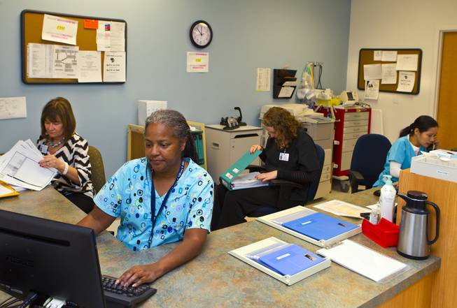 Nurses tend to paperwork and communications at Boulder City Hospital on Monday, April 14, 2014. The hospital is banking on an expansion and renovation to help solve its financial troubles.