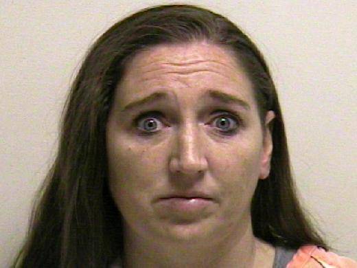This photo provided by the Utah County jail shows Megan Huntsman, who was booked into the Utah County jail on suspicion of killing six of her newborn children over the past decade. Seven dead babies were found in a garage at a Pleasant Grove home where Huntsman lived up until 2011.