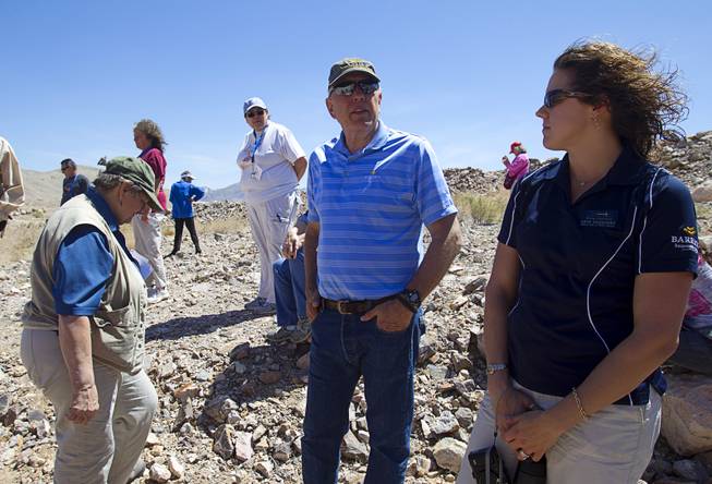 Barrick's Russ Jones, center, talks with teachers at the new Bullfrog Mine near Beatty during the 25th Annual Southern Nevada Earth Science Education Workshop Wednesday, April 16, 2014. The gold and silver mine was in operation from 1988 to 1999. The tour also included a trip the ghost town of Rhyolite. Teachers spent the first day of the workshop focused on classroom activities related to rocks and minerals.