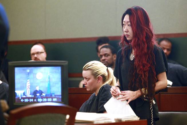 Gloria Lee appears in Clark County District Court for her arraignment on charges stemming from an arson fire at Lee's pet store Wednesday, April 16, 2014.