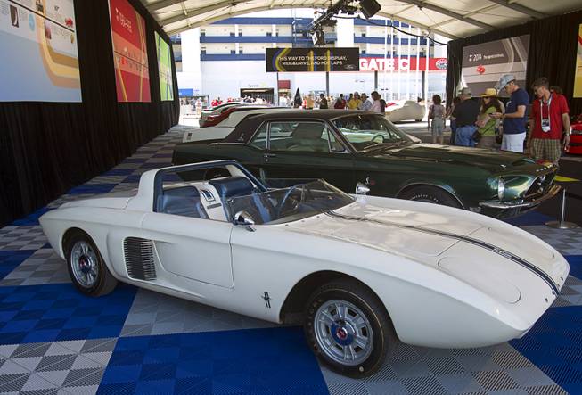 A 1962 Ford Mustang I roadster concept car is displayed during the Mustang 50th Birthday Celebration at the Las Vegas Motor Speedway Thursday, April 17, 2014. The celebration continues through Sunday.