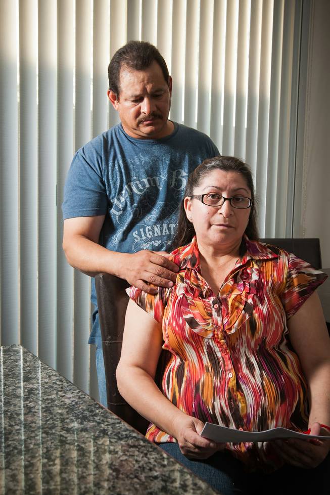 Jorge Espinosa stands beside his wife Maria, of 30 years who has received her deportation orders to return to Mexico, while living in their daughter's home in North Las Vegas Monday, April 15, 2014.  The Espinosas have U.S. citizen children and have lived in the United States for over two decades and continue to fight for their U.S. citizenship.