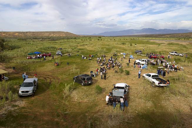 Supporters of rancher Cliven Bundy gather for a Bundy family "Patriot Party" near Bunkerville Friday, April 18, 2014. The family organized the party to thank people who supported Cliven Bundy in his dispute with the Bureau of Land Management.