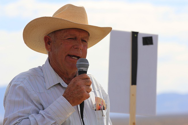 Rancher Cliven Bundy speaks to supporters before the April 12, ...