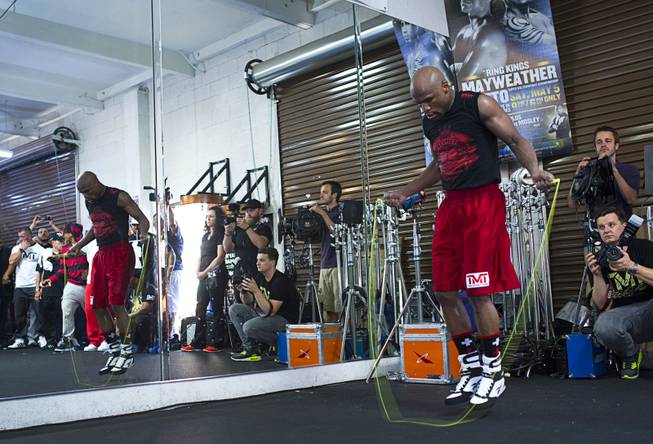 WBC welterweight champion Floyd Mayweather Jr. jumps rope during a media workout at the Mayweather Boxing Club Tuesday, April 22, 2014. Mayweather is preparing for his fight against WBA champion Marcos Maidana of Argentina at the MGM Grand Garden Arena on May 3.