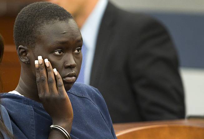 Nyakueth Tear of Salt Lake City, Utah waits in court during her sentencing at the Regional Justice Center Tuesday, April 22, 2014. Tear struck eight pedestrians with her car in the street outside of a North Las Vegas church in August 2013 and fled the scene.