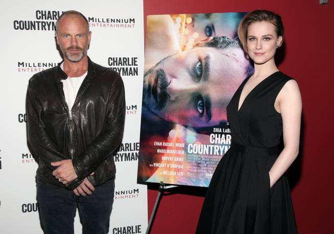 Director Fredrik Bond, left, and actress Evan Rachel Wood, right, attend a screening of "Charlie Countryman" on Wednesday, Nov. 13, 2013 in New York. 
