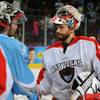 Las Vegas Wranglers goaltender Travis Fullerton shakes hands with Alaska Aces goaltender Olivier Roy after the Aces defeated the Wranglers 4-3 on Friday night at the Orleans Arena. The Aces eliminated the Wranglers in four straight games to end their season.