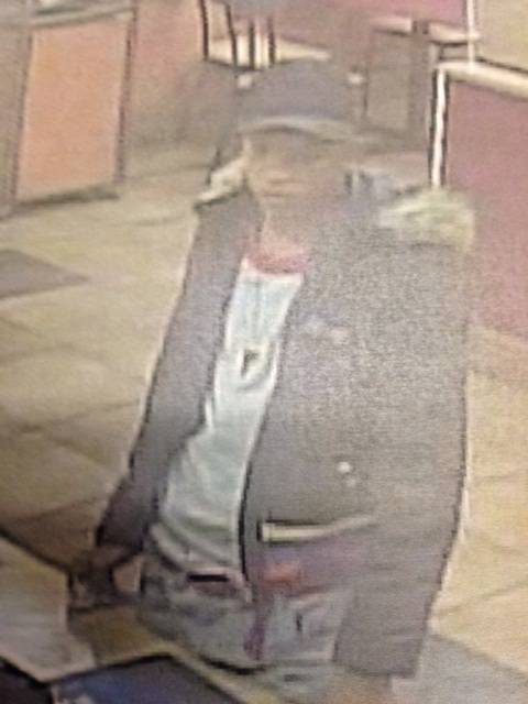 Metro Police identified this person as a suspect in the robbery of a fast-food restaurant on the east side of Las Vegas about 9:10 p.m. on April 5, 2014.