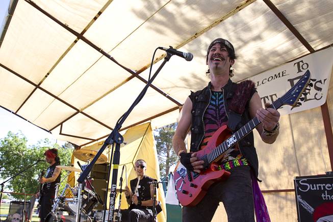 Rikki Sterling performs with the Pirates of Pop during the second annual Pirate Festival Las Vegas in Lorenzi Park Sunday, April 27, 2014.