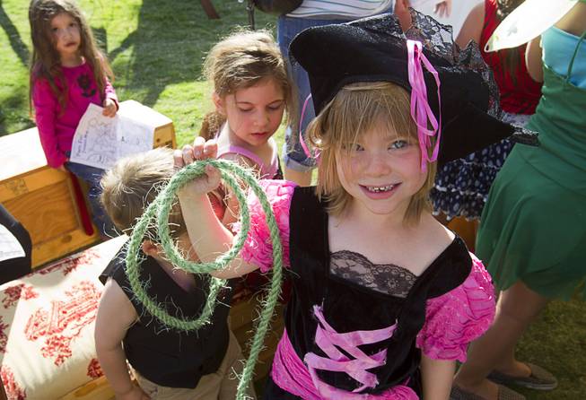 Reya Bacon, 6, poses with a rope that she made during the second annual Pirate Festival Las Vegas in Lorenzi Park Sunday, April 27, 2014.