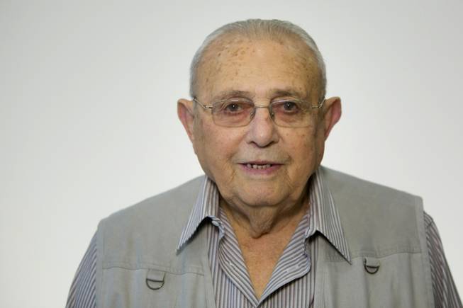 Israeli Holocaust survivor Shmuel Bogler, 84, originally from Hungary, poses for a portrait in Jerusalem. Bogler never had the opportunity to say goodbye to his family, rounded up from their home in Bodrogkeresztur and, like most of the Hungarian Jewish community, transported to Auschwitz. Of the family's 10 children, one had died young, three had fled before the war and three others had previously been taken to work camps. Bogler was left with his parents, one brother and one sister when they were crammed into a cattle car.
