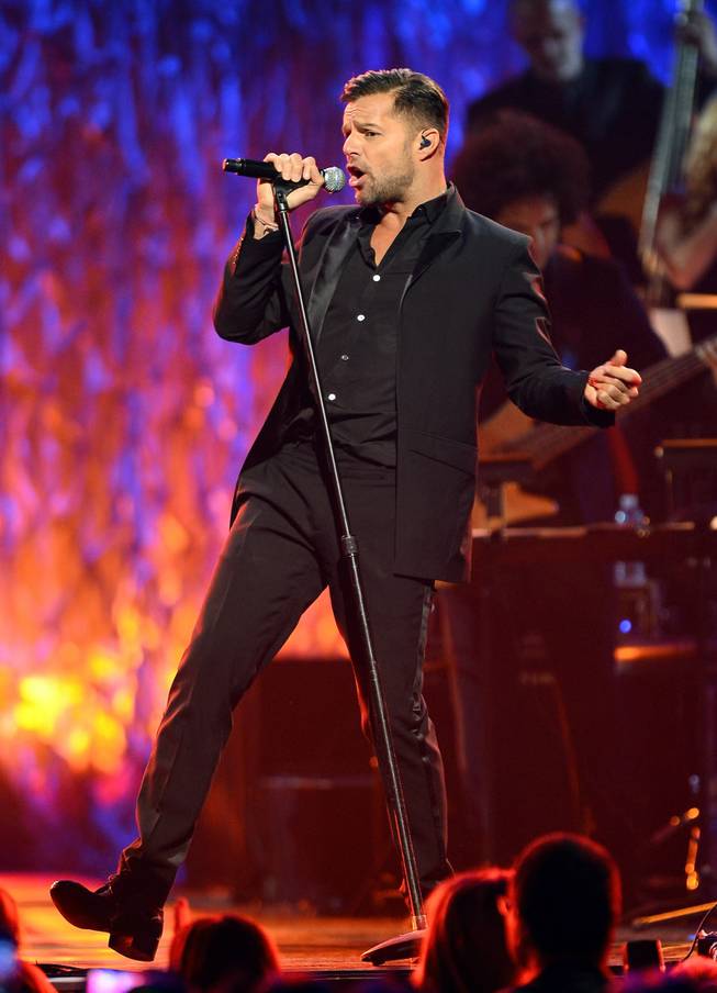Singer Ricky Martin performs during the 18th annual Keep Memory Alive “Power of Love Gala” benefit for the Cleveland Clinic Lou Ruvo Center for Brain Health honoring Gloria Estefan and Emilio Estefan Jr. on Saturday, April 26, 2014, at MGM Grand Garden Arena.

