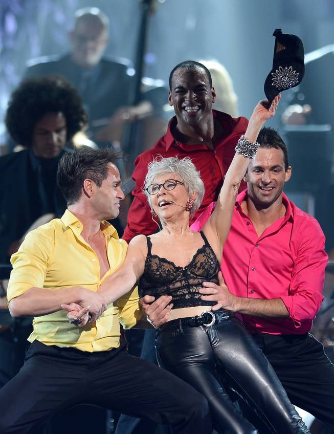 Actress/singer Rita Moreno performs with dancers during the 18th annual Keep Memory Alive “Power of Love Gala” benefit for the Cleveland Clinic Lou Ruvo Center for Brain Health honoring Gloria Estefan and Emilio Estefan Jr. on Saturday, April 26, 2014, at MGM Grand Garden Arena.

