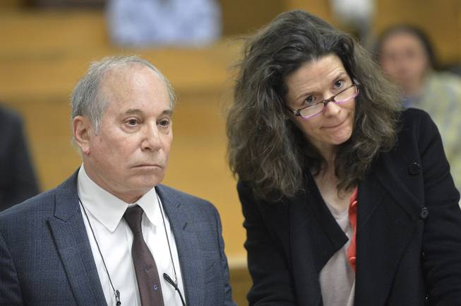 Singer Paul Simon and his wife, singer Edie Brickell, appear at a hearing in Norwalk Superior Court on Monday, April 28, 2014, in Norwalk, Conn. The couple were arrested Saturday on disorderly conduct charges by officers investigating a family dispute at their home in New Canaan, Conn.