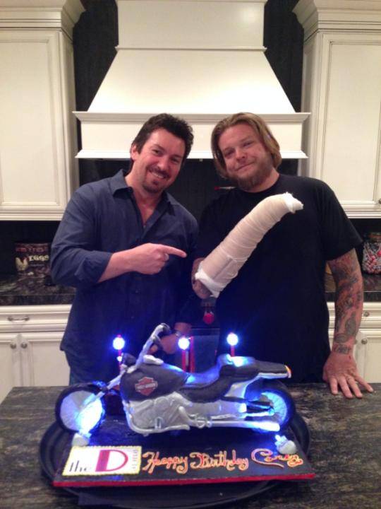Richard Wilk with an injured Corey Harrison and the latter’s 31st birthday cake from the D Las Vegas.