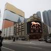 This Feb. 15, 2011, file photo shows a promotional screen with the Chinese characters for MGM displayed at the MGM Grand Macau casino resort, in Macau. MGM Resorts reported quarterly earnings on Tuesday, April 29, 2014.