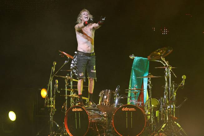 In this Thursday, Sept. 16, 2010, file photo, James Kottak, drummer of the German rock band Scorpions, gestures during the band's farewell tour in La Paz, Bolivia.