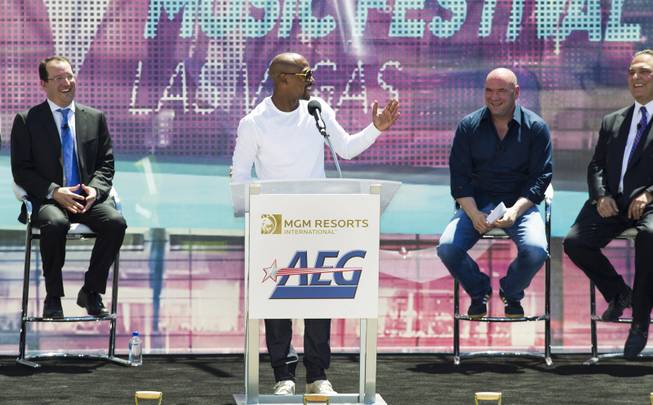 Undefeated boxing champion Floyd Mayweather Jr., gets the crowd laughing during his speech at the AEG and MGM Resorts International ground breaking VIP/media event on Thursday, May 1, 2014.