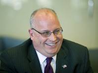 Nevada System of Higher Education regent Kevin Page reacts to a response on Thursday, May 1, 2014.