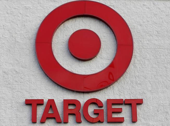 This Thursday, Dec. 19, 2013, photo shows a Target retail chain logo on the exterior of a Target store in Watertown, Mass.