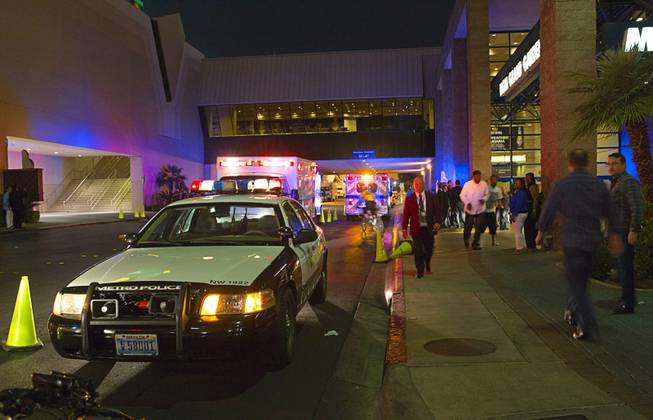 Metro Police cars and ambulances are shown outside the MGM Grand Garden Arena after a crush of fans caused a series of injuries following the Floyd Mayweather Jr. vs. Marcos Maidana title fight at the MGM Grand on Saturday night, May 3, 2014. 