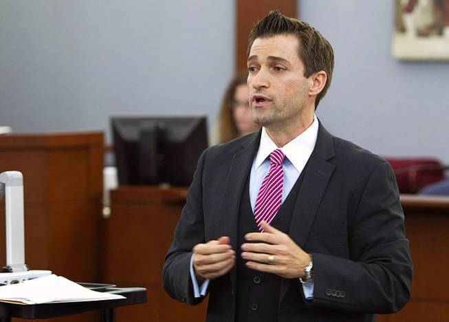Defense attorney Abel Yanez , right, speaks to potential jurors as jury selection begins in the trial for Jason "Blu" Griffith, the man accused of killing Luxor "Fantasy" dancer Debora Flores Narvaez, at the Regional Justice Center Monday, May 5, 2014.