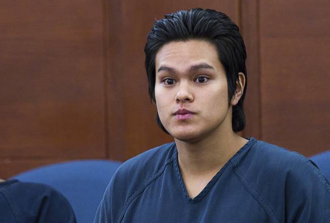 Jeremy Espiritu, 22, is shown in court after sentencing at the Regional Justice Center Tuesday, May 6, 2014. Espiritu told police that he stabbed the family dog, Serenity, with a six-inch serrated knife because he "wanted to." The dog later died of the injury.