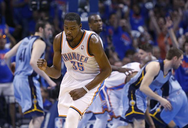 Oklahoma City Thunder forward Kevin Durant (35) pumps his fist as he heads back up the court following a three-pointer in the second quarter of Game 7 of an opening-round NBA basketball playoff series against the Memphis Grizzlies in Oklahoma City, Saturday, May 3, 2014. 